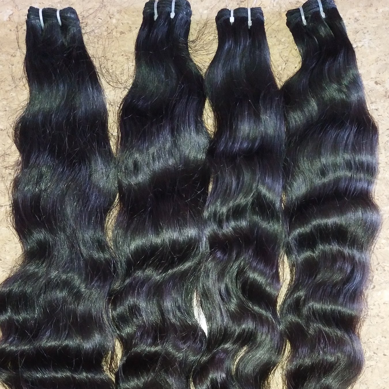 100% No Shedding Tangle Free High Quality Human Wavy hair