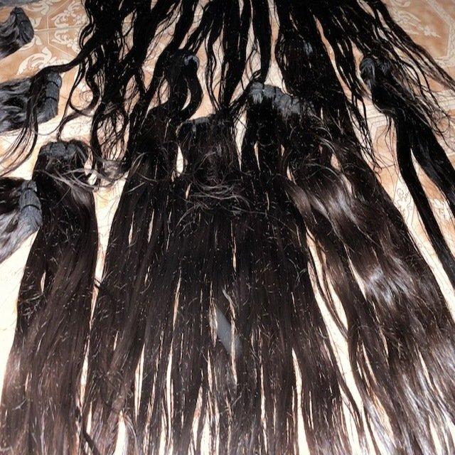Best quality natural human hair extensions 12A grade high quality with natural black and brown colors with lengths 10 to 32 inch