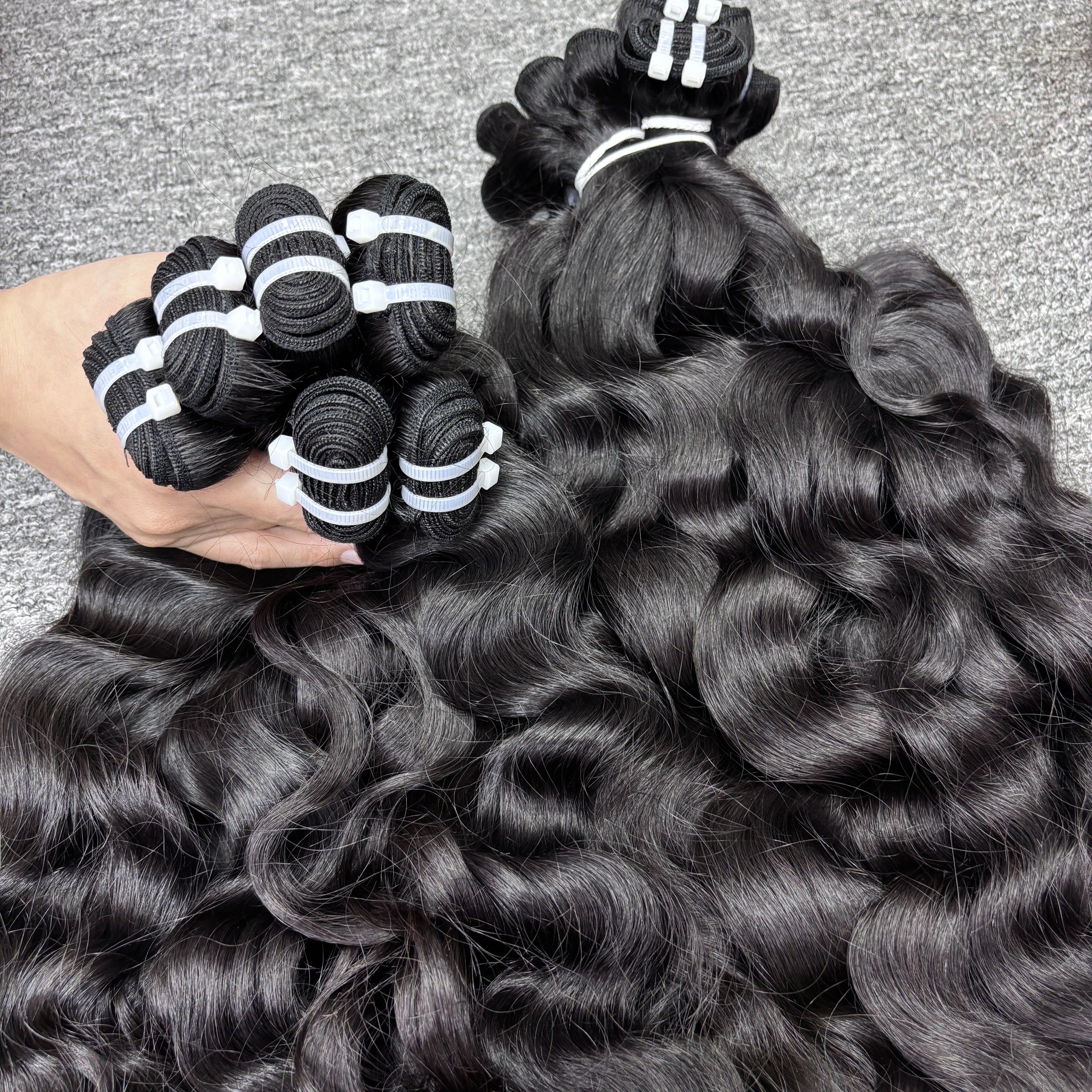 Top Wholesale Raw Natural Wavy Hair Cambodian and Vietnamese Virgin Natural Wave Hair Best Price Cuticle Aligned Human Hair