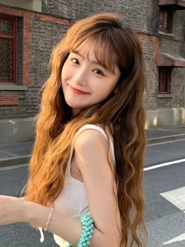 Wig female European and American hot -selling long curly air bangs wool roll corn hot full set
