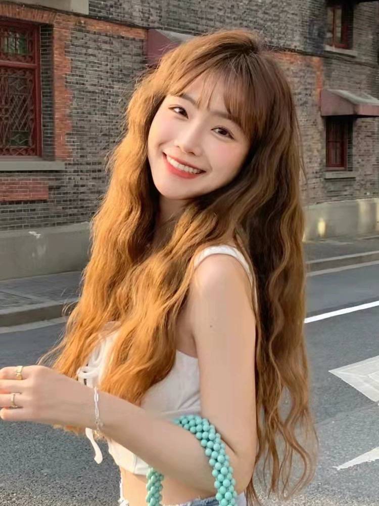 Wig female European and American hot -selling long curly air bangs wool roll corn hot full set