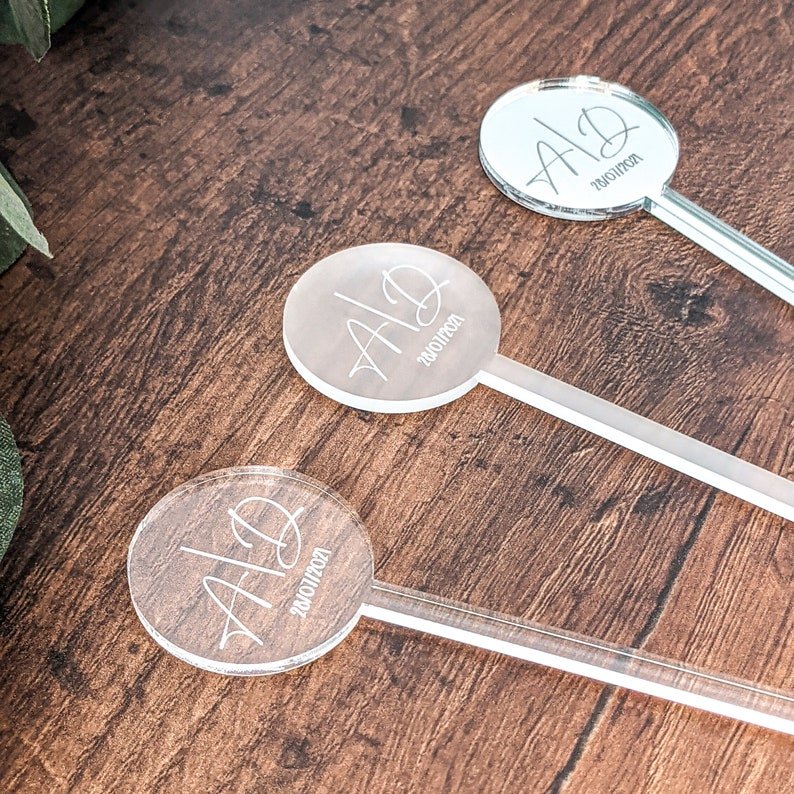 engraved different names on clear / frosted Acrylic Drink Stirrers and Cocktail Swizzle Sticks and Escort Place Cards