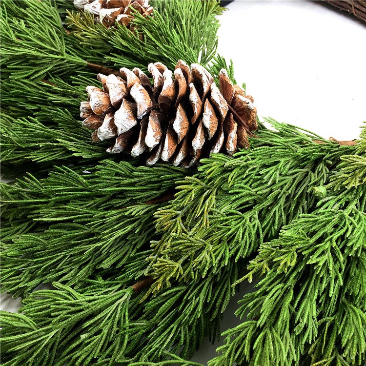 Artificial pine tree leaf and pinecone rings for Christmas decoration