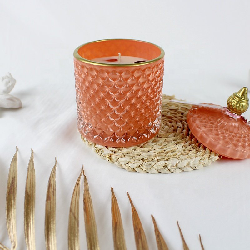 Unique Colorful Embossed Glass Candle Jar With Spire Lid Matte Dried Flowers Glossy Orange Crystal Candle