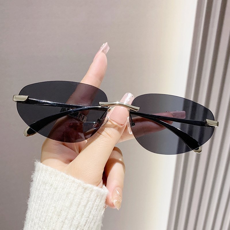 New styles rimless metal oval fashion y2k sun glasses INS popular famous brand designer women's sunglasses