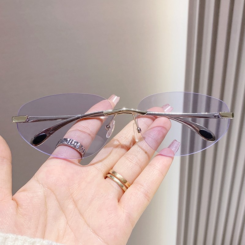 New styles rimless metal oval fashion y2k sun glasses INS popular famous brand designer women's sunglasses