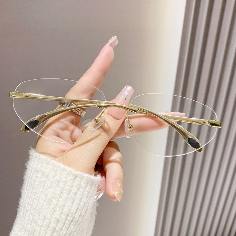 New styles rimless metal oval fashion y2k sun glasses INS popular famous brand designer women's sunglasses