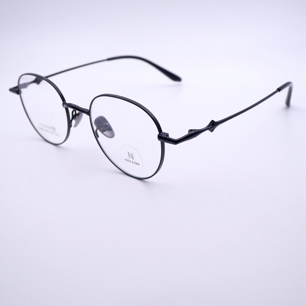 9950 Hot trend new ultra-light semi-titanium retro spectacle frame men and women round small optical