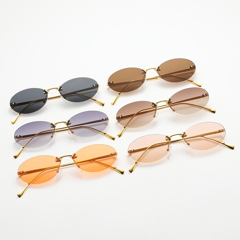 wholesale rimless metal popular oval fashion sun glasses women custom logo sunglasses for men