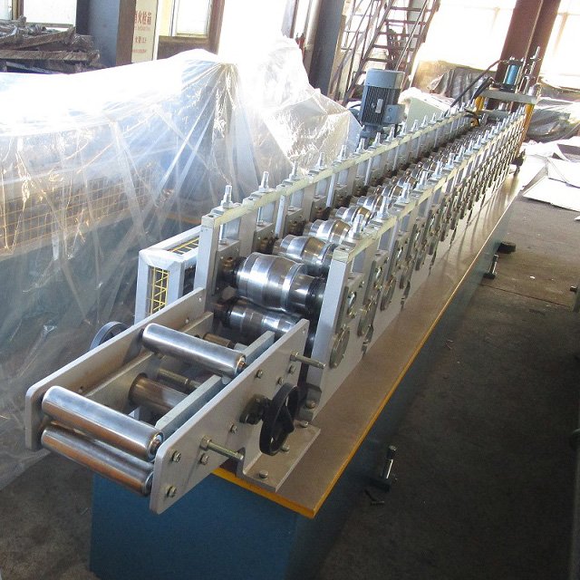 High quality roller metal frame panel shutter door roll forming machine China