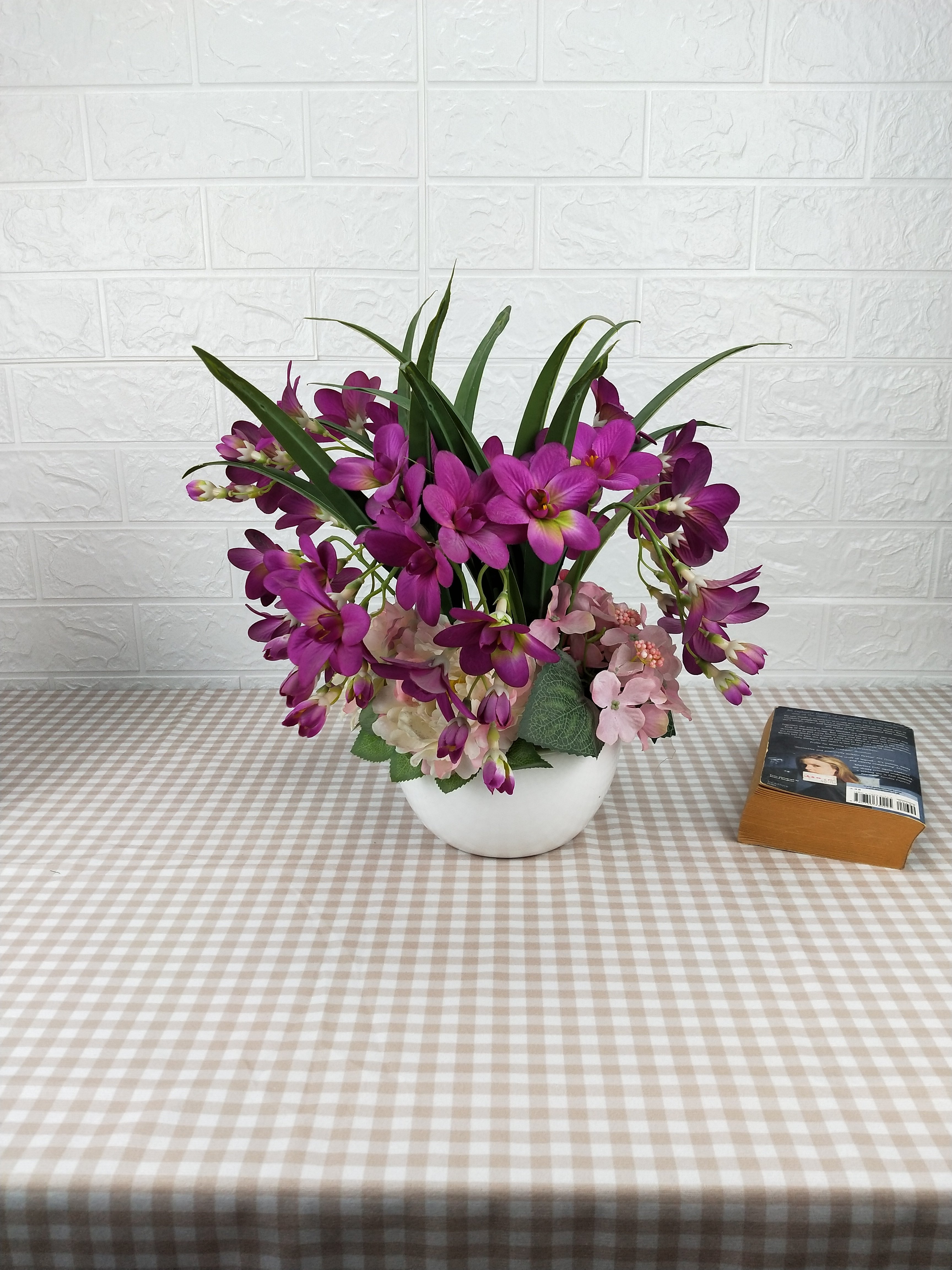 Handicraft and art design look real artificial flower arrangement blossom orchid with ceramic pot for home decor