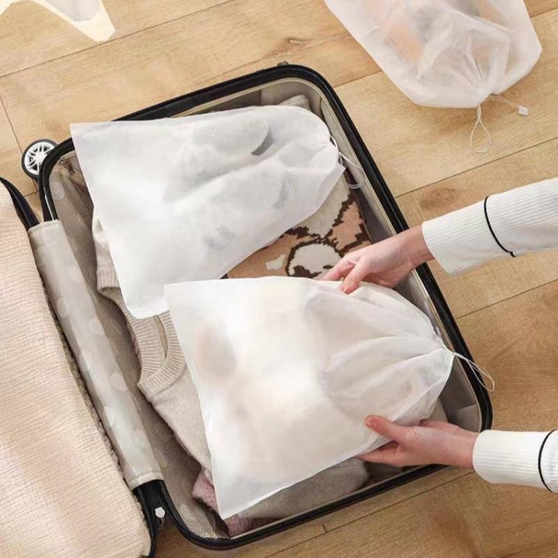 Anti-yellow bag disposable non-woven shoes collection bag small white shoes dust-proof suntan shoe cover clothesline wash bag