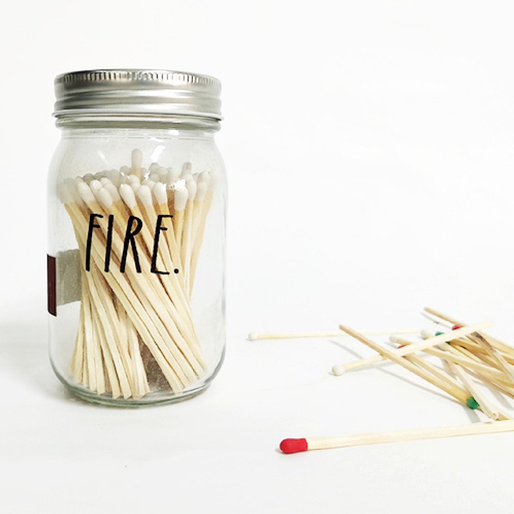 coloful tips wooden matchsticks in bottle matches