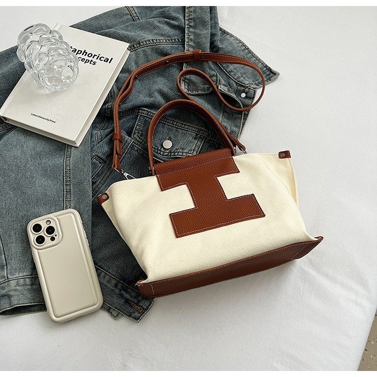 Japanese and Korean fashion new hand-held tote bag canvas large capacity color matching canvas shoulder messenger bag