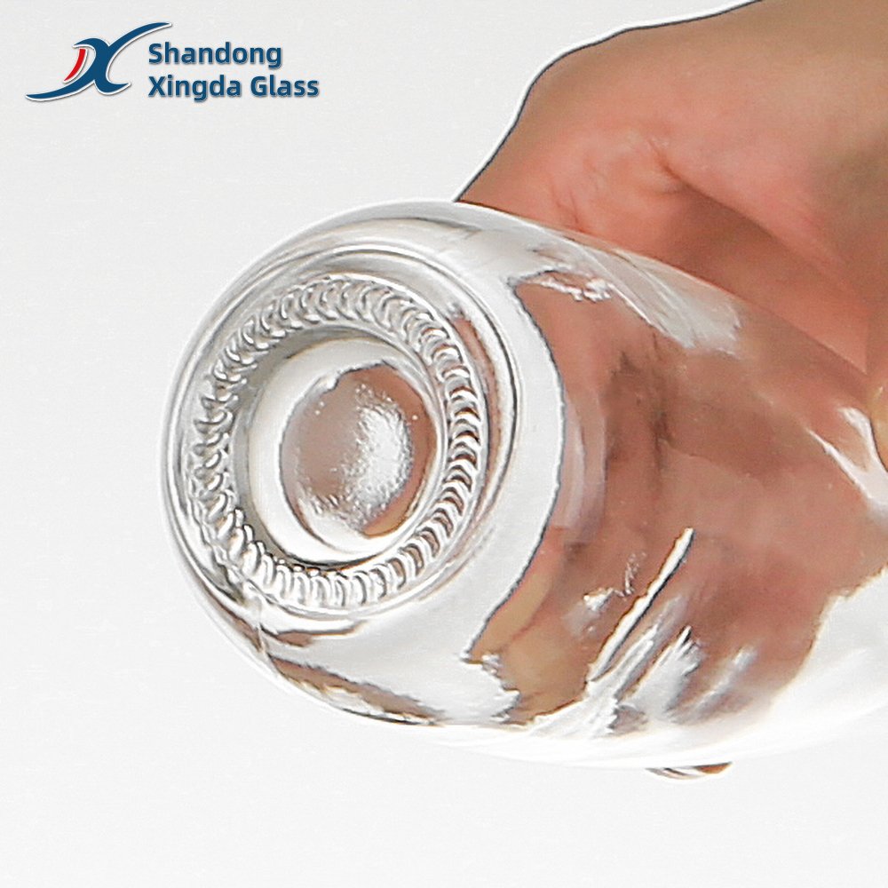 Xingda Factory Screen Printing Customized Beverage Cork 1L Glass Bespoke Glass Mineral Water Bottles with Aluminum Cap