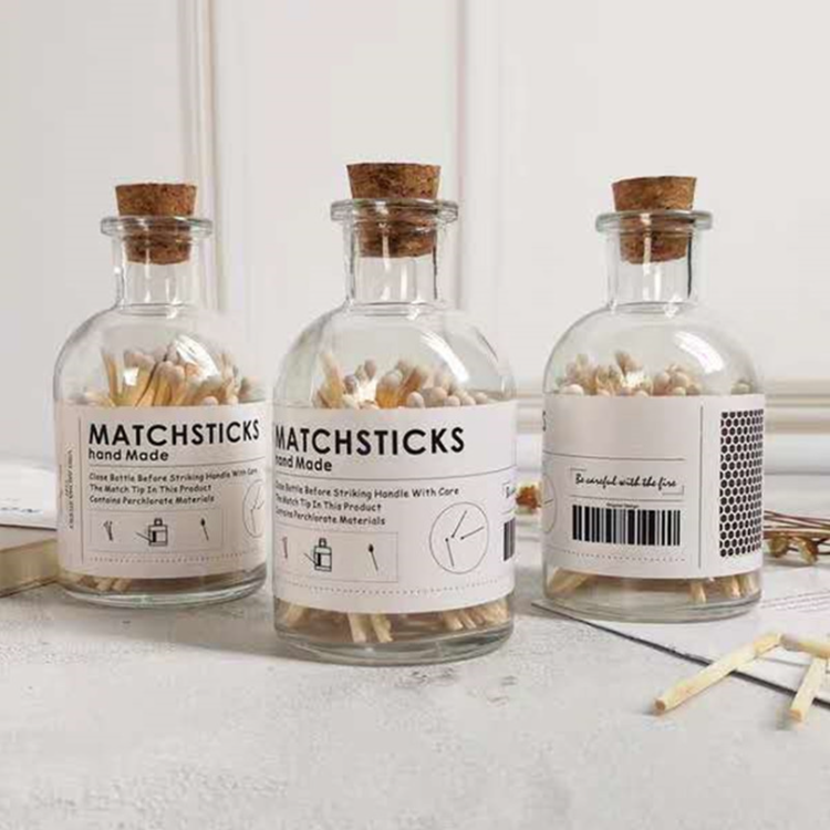 Small glass bottle matches in glass jar matchsticks