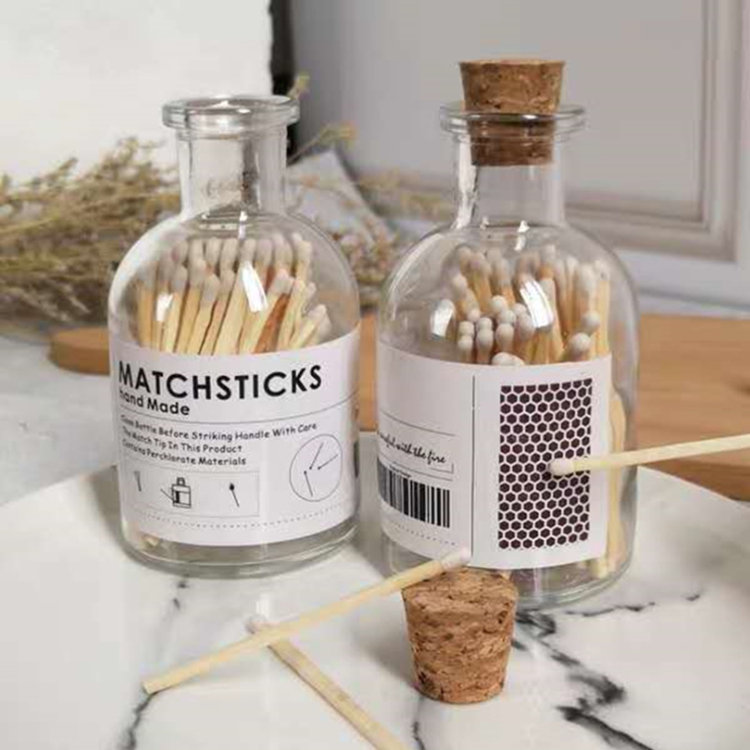 Small glass bottle matches in glass jar matchsticks