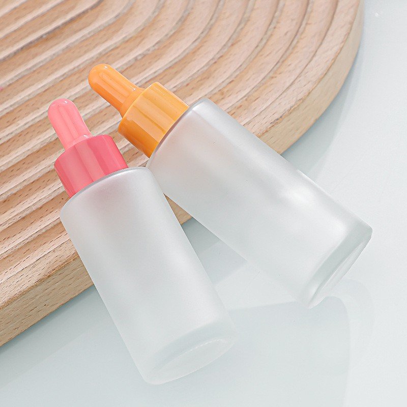 Luxury cosmetic container round flat shoulder colorful frosted perfume bottle essential oil serum glass dropper bottle