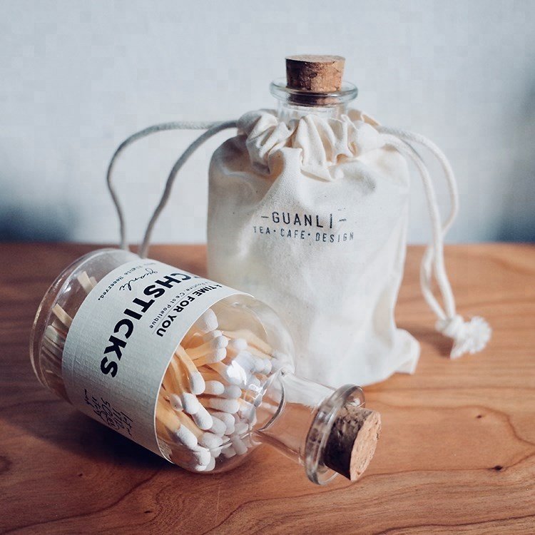 long wooden matches in bottle with label matches jar with match striker paper