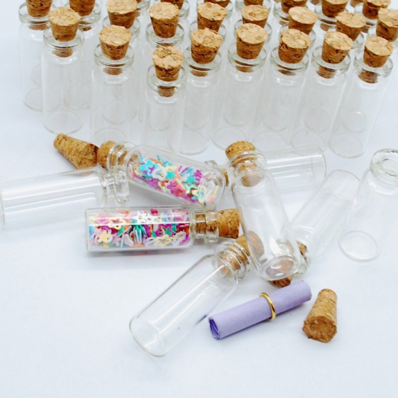 Wholesale mini wishing bottle 5ml 10ml 15ml 20ml 25ml glass vials Custom Logo Clear Glass Match Storage Jar with cork stopper