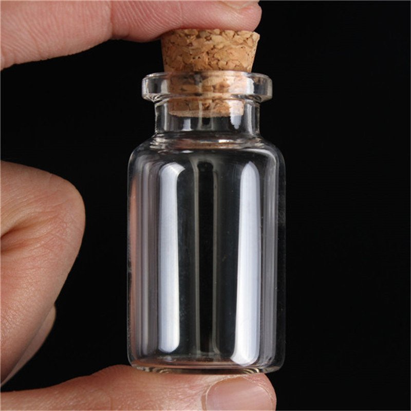 Wholesale mini wishing bottle 5ml 10ml 15ml 20ml 25ml glass vials Custom Logo Clear Glass Match Storage Jar with cork stopper