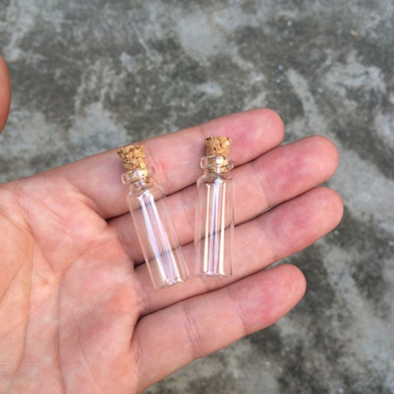 Wholesale mini wishing bottle 5ml 10ml 15ml 20ml 25ml glass vials Custom Logo Clear Glass Match Storage Jar with cork stopper