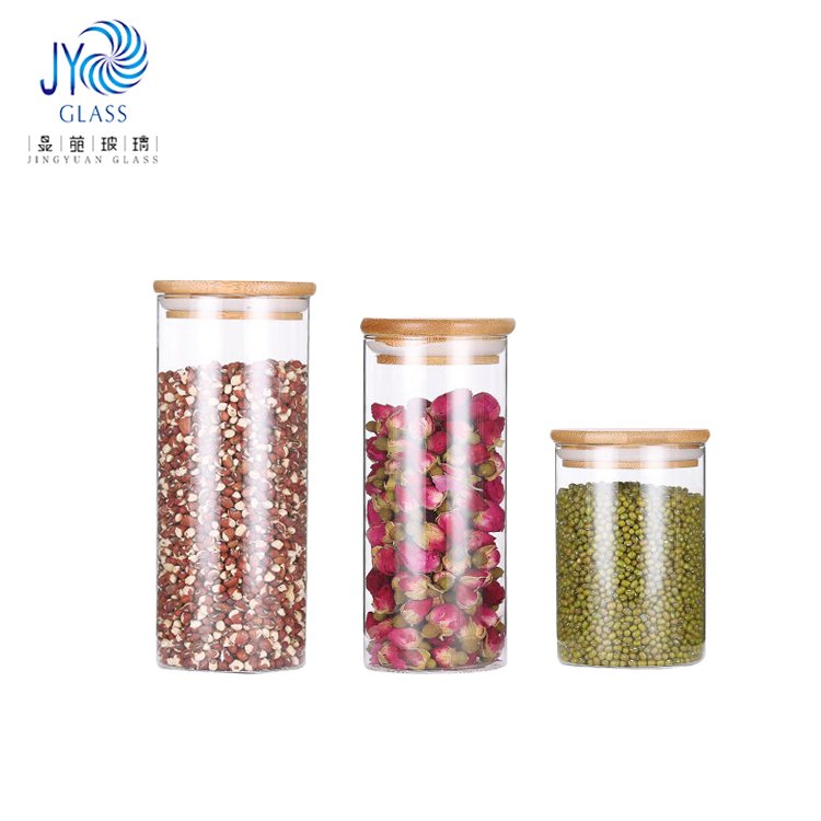 round glass storage jar with bamboo lid Kitchen glass spice jar with wooden lid clear tube shaped glass borosilicate jar