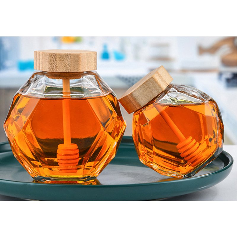 Fancy Empty Hexagon Food Storage Sealed Tank Honey Jar Container Glass Honey Jam Jars With Wooden Lid And Spoon