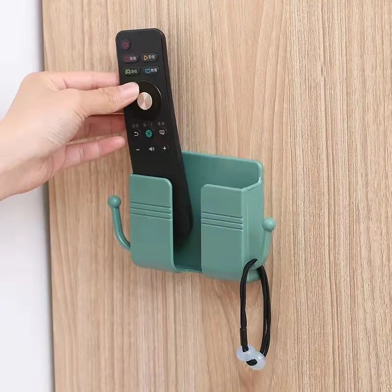 Wall-mounted mobile phone holder universal plastic storage box remote control holder mobile phone with hook charging stand