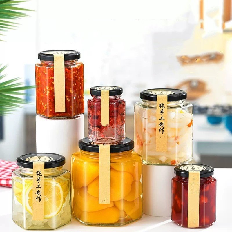 High Quality Hexagon Thickened Transparent Kitchen Canning Food Storage Containers Glass Honey Jar With Sealed Metal Lid