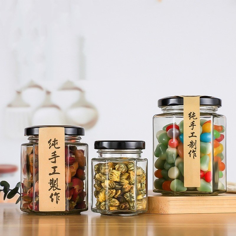 High Quality Hexagon Thickened Transparent Kitchen Canning Food Storage Containers Glass Honey Jar With Sealed Metal Lid