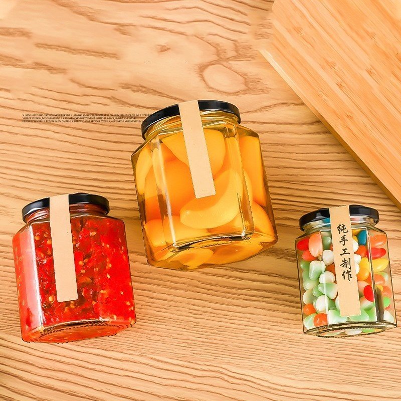 High Quality Hexagon Thickened Transparent Kitchen Canning Food Storage Containers Glass Honey Jar With Sealed Metal Lid