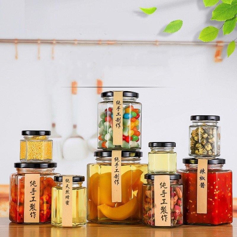 High Quality Hexagon Thickened Transparent Kitchen Canning Food Storage Containers Glass Honey Jar With Sealed Metal Lid