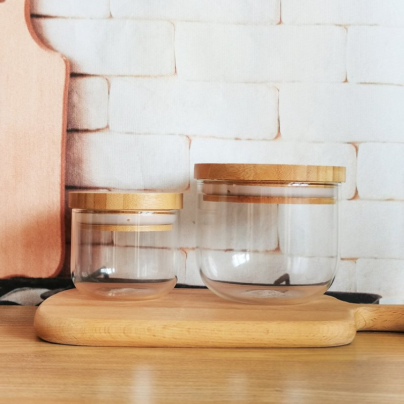 New designed unique kitchen glass storage container round bottom clear glass spice bottle jars with Thickened sealed bamboo lid