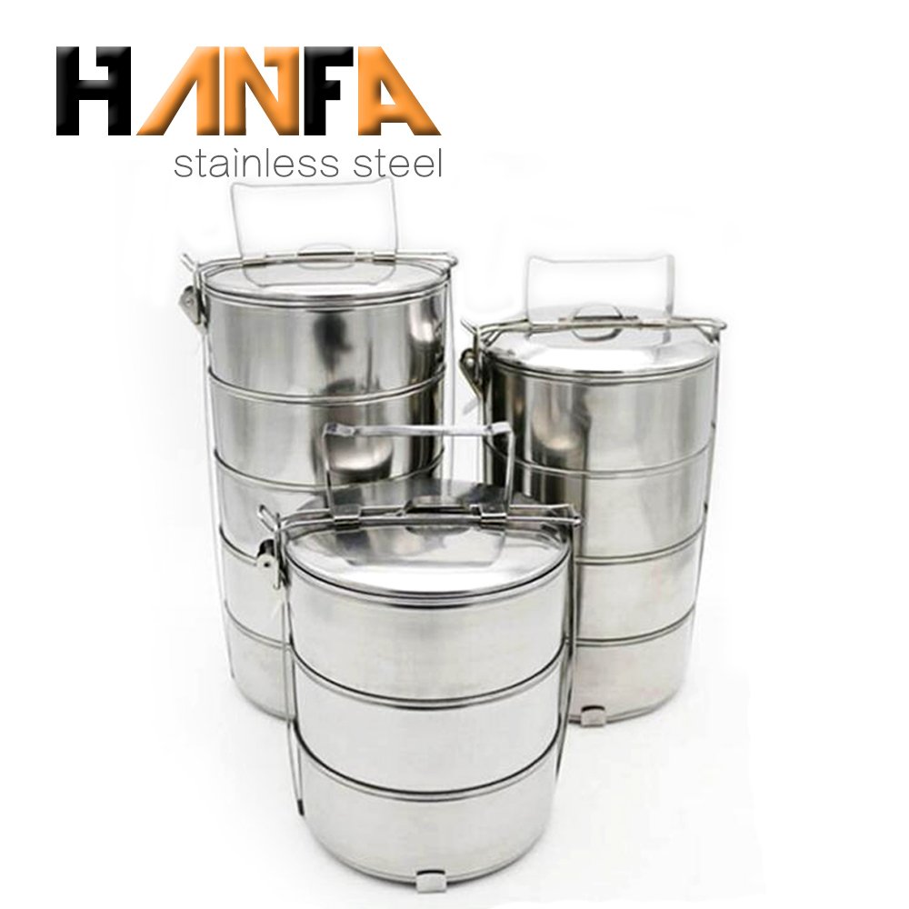 Hand holding 14cm diameter food storage container set cheap price stainless steel tiffin box lunch food carrier