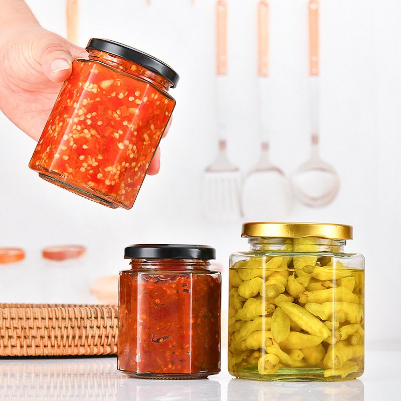 High Quality Customized Hexagon Shape Glass Jar for Honey Jams Food Storage with Lid