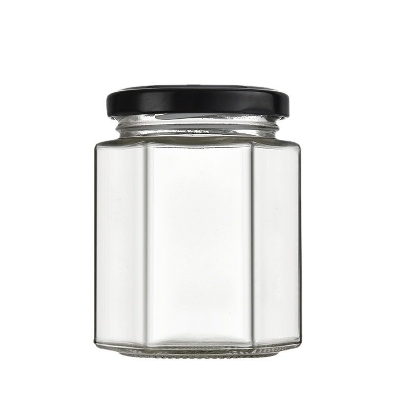 High Quality Customized Hexagon Shape Glass Jar for Honey Jams Food Storage with Lid