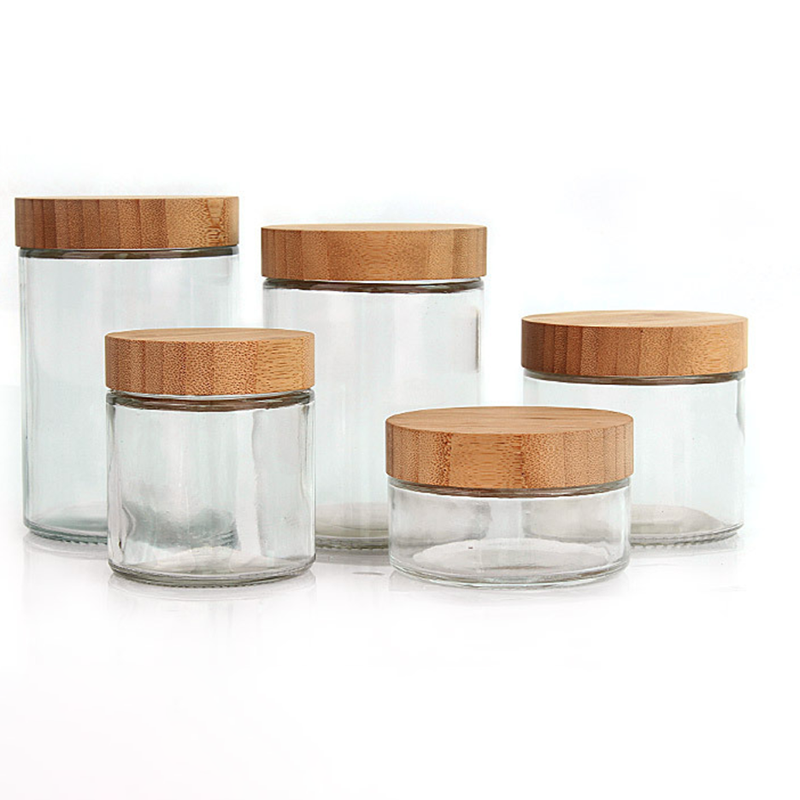 Bamboo and wood covered flower tea vase clear empty refillable glass bottle with natural bamboo lid