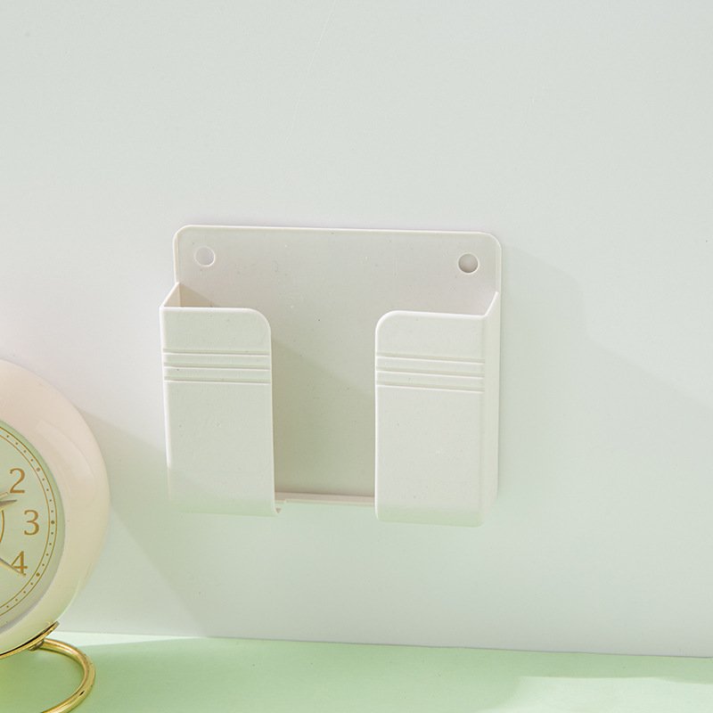 Hot Multifunction New Wall Phone Holder Adhesive Mobile Phone Wall Charger Holder And Remote Control Stand