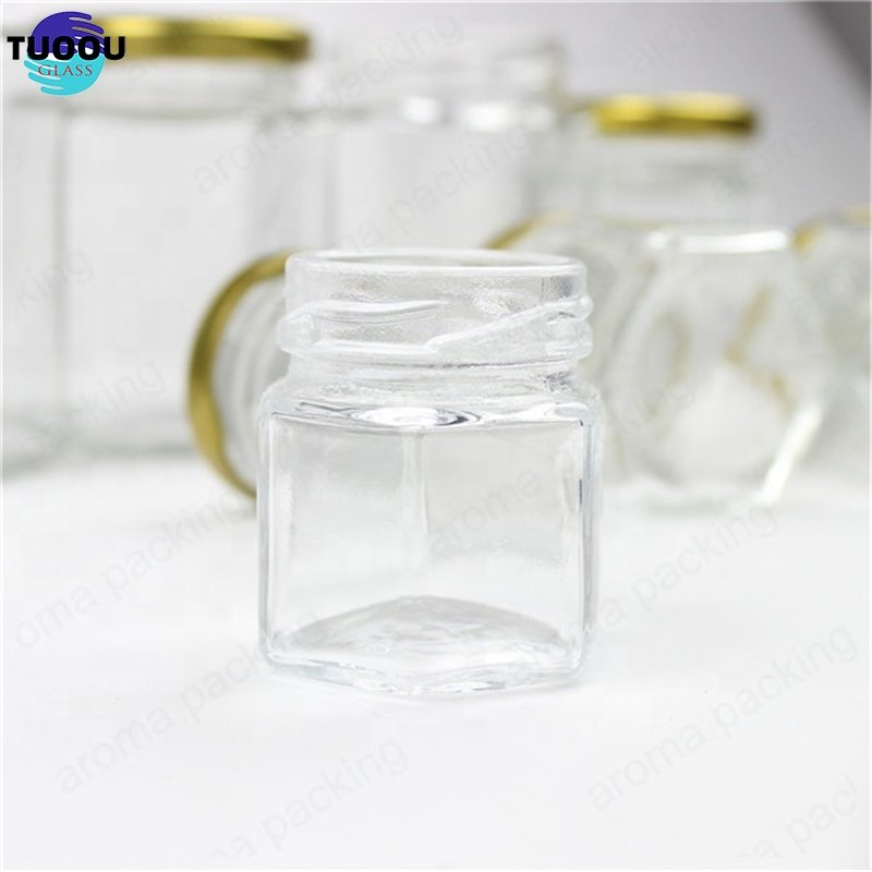 Wholesale 30ml 50ml 60ml Clear Glass Storage Jar Hexagon Kitchen Glass Bottle Round Glass Honey Jar With Gold Lids