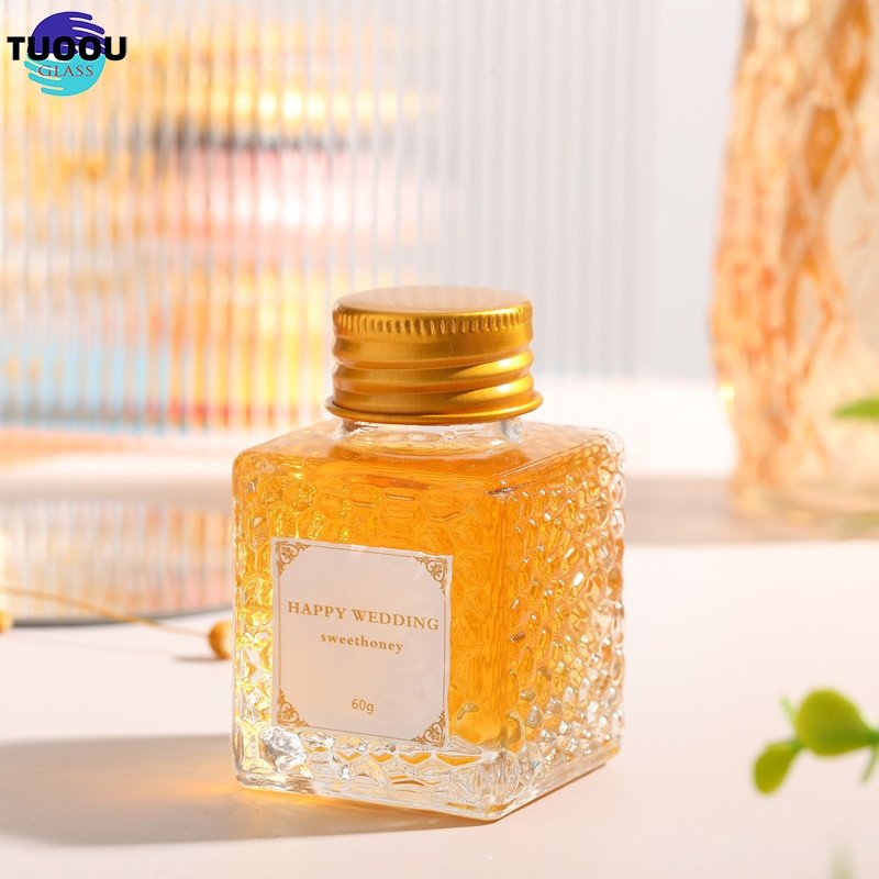 Wholesale Glass Honey Container Honey Storage Bottle Glass Honey Jar With Matel Lid