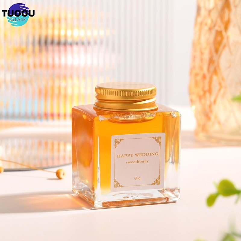Wholesale Glass Honey Container Honey Storage Bottle Glass Honey Jar With Matel Lid