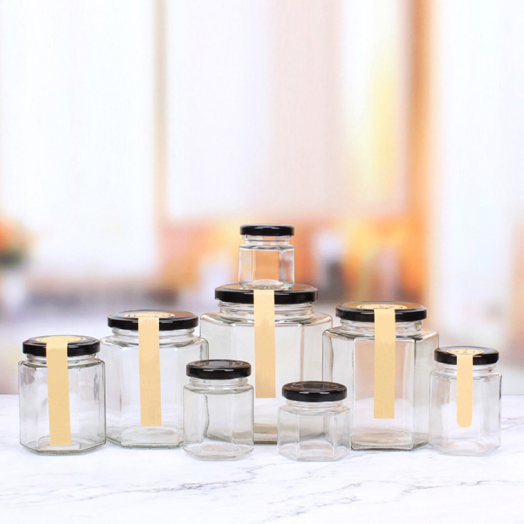 Professional Hexagon Thickened Transparent Kitchen Canning Food Storage Containers Glass Honey Jar With Sealed Metal Lid