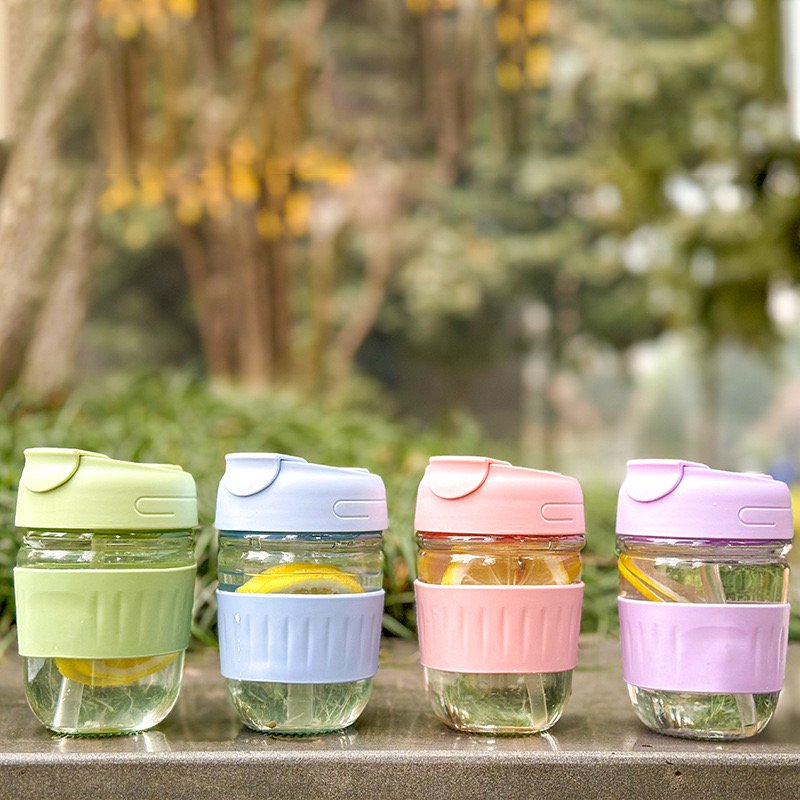 Discount Price 350ml Unique Design High Quality Large Capacity Drinking Glass Water Bottle With Flip Top lids and silicone cover