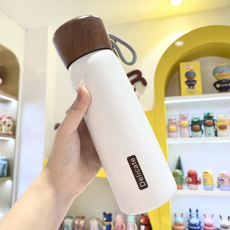 Zogifts Hot Selling Wood Grain Color Vacuum Flask Thermos 400Ml 500Ml Stainless Steel Water Bottle With Rope And Lid Leak-Proof