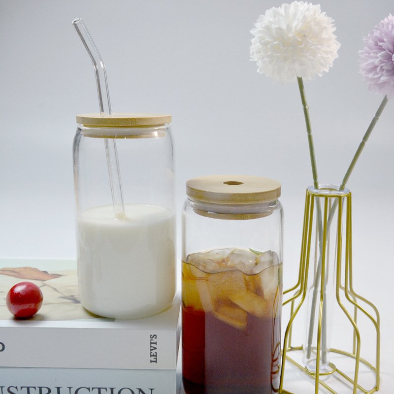 Hot Sale Drinking Glasses with Bamboo Lids and Glass Straw Can Shaped High Borosilicate Heat Resistant Glass Cups
