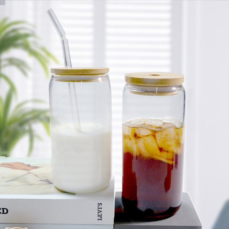 Hot Sale Drinking Glasses with Bamboo Lids and Glass Straw Can Shaped High Borosilicate Heat Resistant Glass Cups