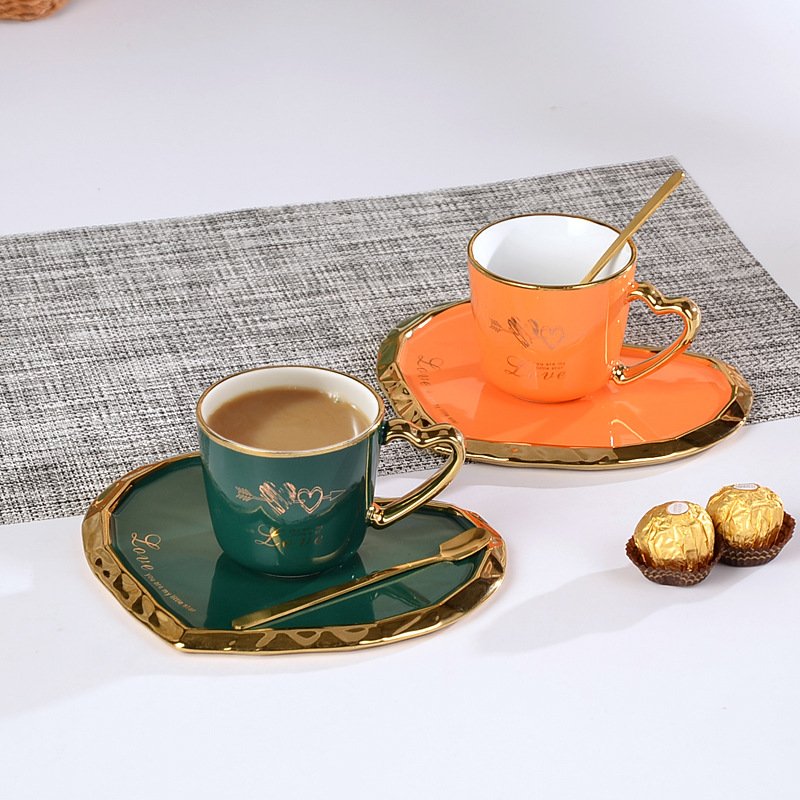 Zogifts gold plated heart shape handle tea cups saucer sets irregular nordic ceramic coffee mugs with tray and spoon