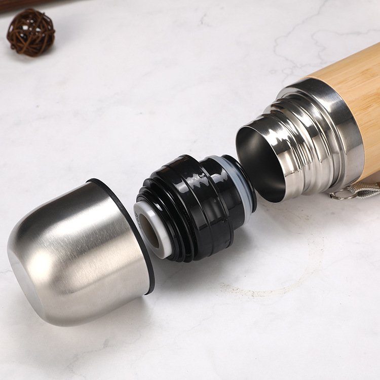 2024 New Products Outdoor Travel Flask 450ml Stainless Steel Insulated Vacuum Bullet Shape Bamboo Shell Water Bottle