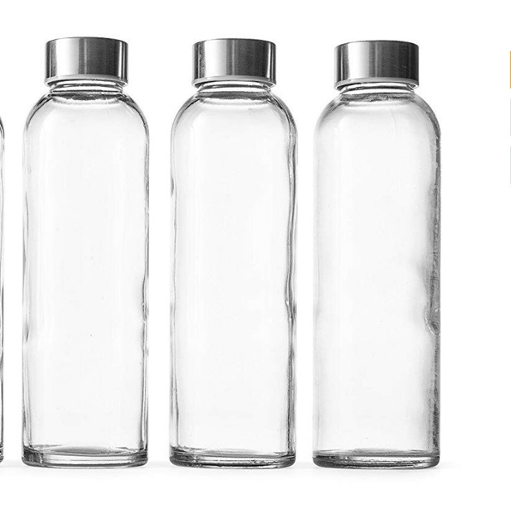 wholesale 18 oz Clear Glass Bottles with Lids Reusable Glass Water Bottles with Stainless Steel lid for Juicing